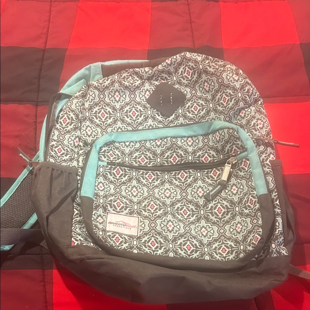 Patterned Black And Blue Backpack - image 1